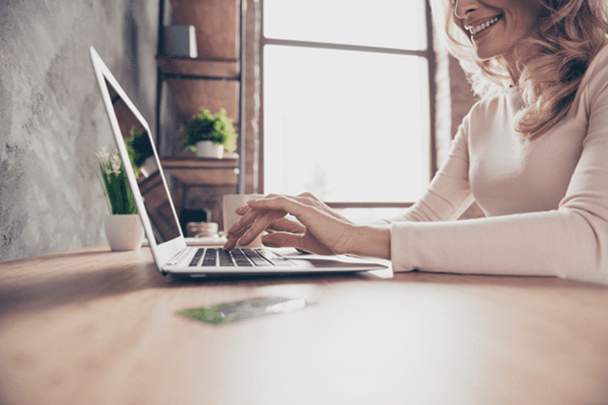 Woman on home at laptop