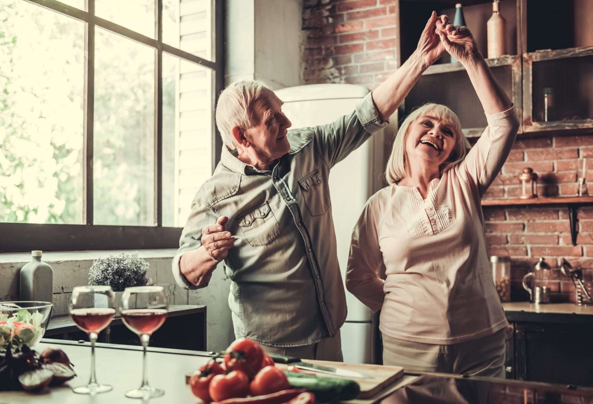 Man and Woman dancing in the kitchen