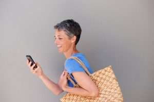 Woman with bag and phone